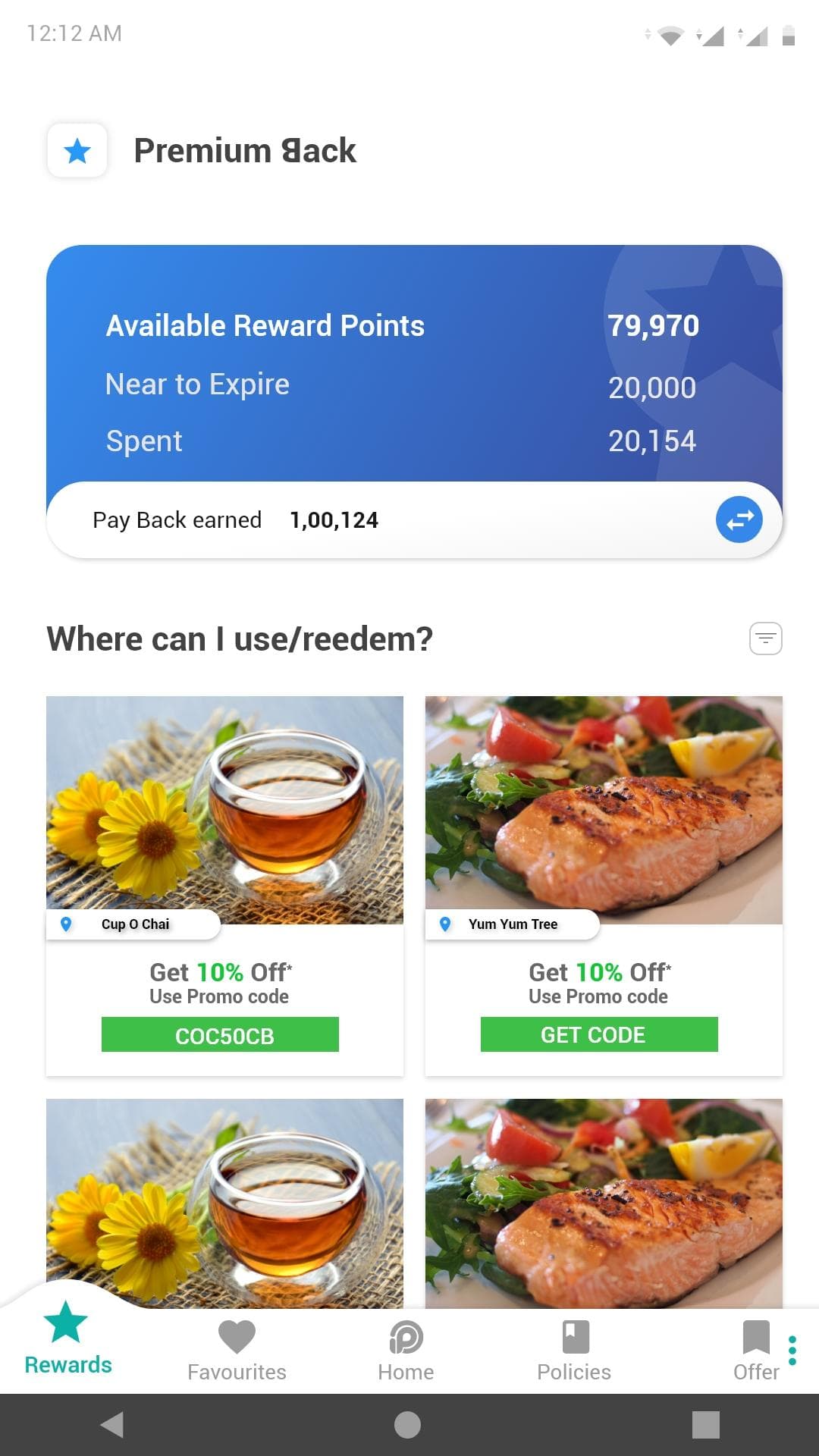 The Premium Back screen: a reward points balance above a grid of merchant coupons the points can be spent on.